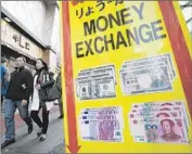  ?? Ahn Young-joon
Associated Press ?? STALWART American partners, including South Korea, are backing the Asia Infrastruc­ture Investment Bank. Above, a money exchange ad in Seoul.