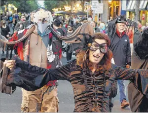  ?? MITCH MACDONALD/THE GUARDIAN ?? The crows were on the move in this Guardian file photo from last year’s March of the Crows down Victoria Row on their way to Victoria Park.