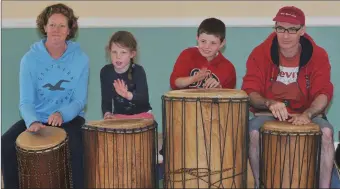  ??  ?? Keeping the beat at a drum workshop in Bunscoil an Chlochair on Friday morning.