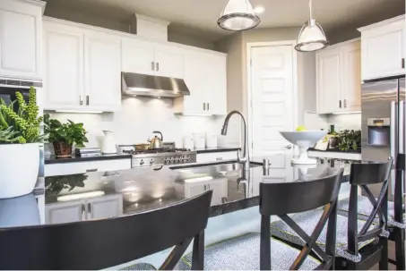  ?? TRI POINTE HOMES ?? A gourmet kitchen with an oversized island is the focal point of the homes at Alameda Landing and makes the perfect place for families to gather. Don’t miss the chance to own a home at Cadence or Linear today.