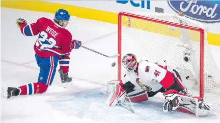  ?? THE CANADIAN PRESS
PAUL CHIASSON/ ?? Canadiens’ Dale Weise scores on Senators goalie Craig Anderson at the Bell Centre on Tuesday. The Senators won 2-1 in overtime.