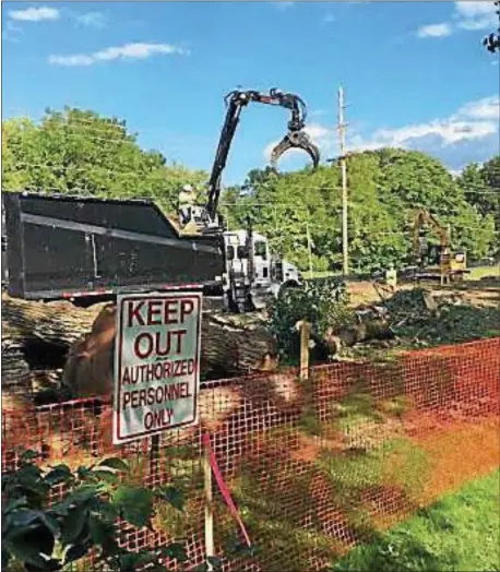  ?? SUBMITTED PHOTO ?? A orange constructi­on fence and “Keep Out – Authorized Personnel Only” sign separates Andover residents from their open space.