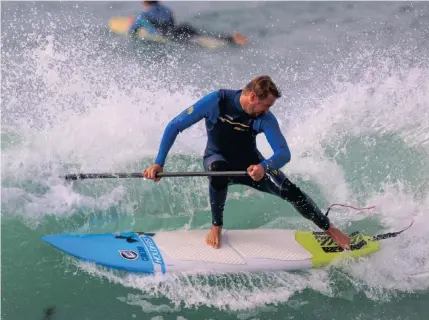  ??  ?? WHAT’S SUP? South Africa’s Thomas King shows off his paddle-surfing skills.