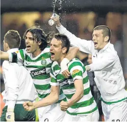  ?? Picture: SNS. ?? Massimo Donati, right, celebrates with Georgios Samaras and Jan Vennegoor of Hesselink after the final whistle confirmed Celtic as league champions in 2008.