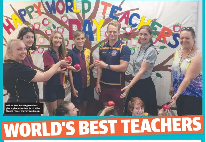  ?? William Ross State High students give apples to teachers Jacob Miles, Shauna Fowler and Rayleen Brown. ??