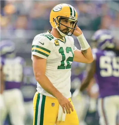  ?? ABBIE PARR/AP ?? After not playing in the preseason, reigning league MVP Aaron Rodgers turned the ball over twice and didn’t throw a touchdown pass in the Packers’ 23-7 season-opening loss to the Vikings. Rodgers wasn’t alone as many other top QBs who sat out the preseason lost.
