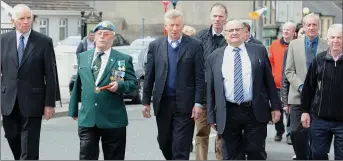  ??  ?? A section of the parade that walked through the Millstreet streets on Easter Sunday. Pictures: John Tarrant