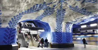  ?? HANS EKESTANG ?? Per Olof Ultvedt chose the colour blue for its calming properties to brighten up Stockholm’s T-Centralen station.