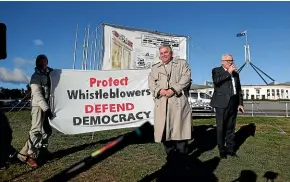  ?? NINE ?? Senator Rex Patrick and Independen­t MP Andrew Wilkie, right, during a rally to support Witness K and Bernard Collaery at the front of Parliament House in Canberra.