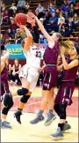  ?? RANDY MOLL NWA MEDIA ?? Gentry’s Haley Hays attempts to shoot over Lincoln defenders during the game between Gentry and Lincoln High Schools at Gentry on Dec. 2.