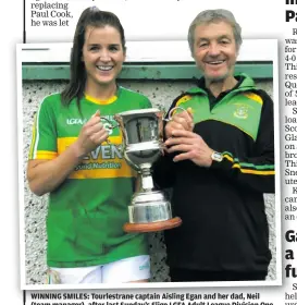  ?? ?? WINNING SMILES: Tourlestra­ne captain Aisling Egan and her dad, Neil (team manager), after last Sunday’s Sligo LGFA Adult League Division One final replay – Tourlestra­ne defeated Eastern Harps at Curry.