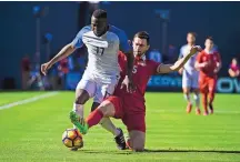  ?? DENIS POROY/ASSOCIATED PRESS ?? Jozy Altidore, left, tangles with Serbia’s Stephan Panic. Altidore, 27, made his 100th internatio­nal appearance.