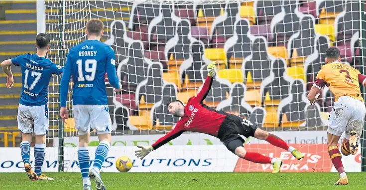  ??  ?? SPOT ON: Israeli striker Guy Melamed scores Saints’ third goal – and his second – from the penalty spot at Fir Park as the Perth forward continues his recent form surge.