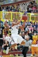  ?? DENNIS KRUMANOCKE­R - FOR DIGITAL FIRST MEDIA ?? Kutztown’s Anthony Lee drive for a basket during the Golden Bears’ regular season finale on Feb. 24.