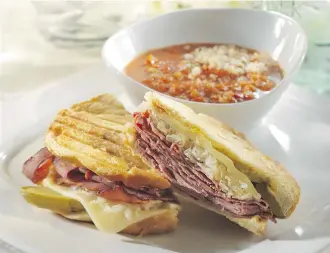  ?? ATCO Blue Flame Kitchen ?? This Reuben Panini can be made with either corned beef or pastrami between thick slices of bread.