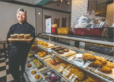  ?? PHOTOS: AZIN GHAFFARI ?? Pastry Chef Paige Flohr shows off some of her creations at Ten Degrees Chocolate in Calgary.