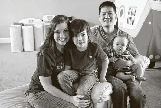  ?? Photos by Jerry Lara / Staff photograph­er ?? Dr. Marvin Chang and his wife, April, are shown with their children, Evan, 7, and Tristan, 7 months. Their Mitchell Chang Foundation is named after their late son.