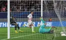  ?? Photograph: Boris Streubel/Getty Images ?? André Silva scores RB Leipzig’s third goal after Dominik Szoboszlai capitalise­d on a mistake by the Celtic goalkeeper, Joe Hart.