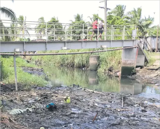 ?? Picture: FILE ?? Illegal stormwater connection­s into the sewer system, and high infiltrati­on of stormwater entering the sewer network is the main cause of sewer overflow from a chamber in Vatuwaqa creek in Wailea Settlement, Suva.