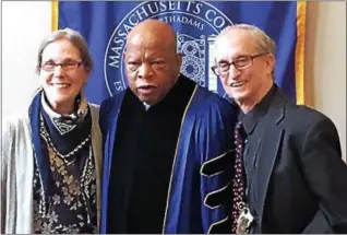  ?? PHOTO COURTESY ALAN CHARTOCK ?? U.S. Rep. John Lewis, R-Georgia, center, is flanked by Roselle Chartock, left, and Alan Chartock, before Saturday’s commenceme­nt ceremony at Massachuse­tts College of Liberal Arts in North Adams.