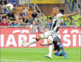  ??  ?? Inter Milan’s Stefano Sensi heads the ball to score against Udinese, in Milan on Saturday.
AP