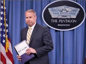  ?? The Associated Press ?? SURVEY: In this May 1 photo, Nate Galbreath, Senior Executive Adviser for the Department of Defense Sexual Assault Prevention and Response Office (SAPRO), leaves a news conference at the Pentagon. Shocked and offended by explicit questions, some U.S....