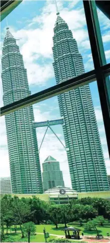  ??  ?? Left: View of Twin Towers and Park from Level 3 Pre-function Area Kuala Lumpur Convention Centre