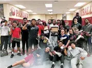  ?? [PHOTO PROVIDED] ?? Members of Putnam North High School’s football team pose with their new Under Armour cleats donated by Cleats for Kids.