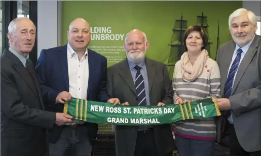  ??  ?? New Ross 2018 parade grand marshall Brian McMahon being presented with his sash by the parade committee. From left: PRO Tom Doyle, chairman Anthony Connick, recently retired CBS Primary principal Brian MacMahon, secretary Rose Whelan, and Ollie Sommers.