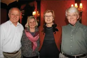  ??  ?? Devon residents Luigi and Judy DiFilippo stop to speak with Berwyn’s Monika Klug and George Edel.