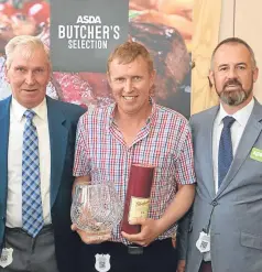  ??  ?? From left: Bill and Billy Nelson with Paul Geary, Asda’s senior fish, meat and poultry buyer.