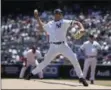  ?? SETH WENIG - THE ASSOCIATED PRESS ?? Former New York Yankee Mariano Rivera pitches during the Old Timer’s Day game at Yankee Stadium, Sunday, June 23, 2019, in New York.