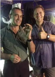  ??  ?? Above: Diving buddies and fellow “Wet Mules” Craig Challen (left) and Richard “Harry” Harris smile for the camera after successful­ly completing their mission. Above right: Inside Tham Luang cave.