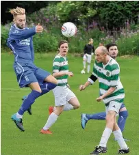  ??  ?? Jump to it A Blantyre Vics player tries to block a header during the tribute game