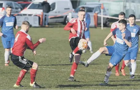 ??  ?? Sunderland RCA (red and white) battle to victory against Seaham Red Star at Meadow Park on Saturday. Picture s by Kevin Brady,
