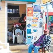  ?? FRANK GORMLIE ?? Willie Washington is seen by Willie’s Shoe Shine shed in a Newport Avenue parking lot in Ocean Beach.