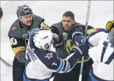  ??  ?? Ryan Reaves, center, brings a toughness to Vegas as he did to the Penguins, but he’s on the ice a lot more now.