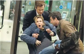  ?? — UNIVERSAL STUDIOS ?? Colin Firth, Renee Zellweger and Patrick Dempsey in a scene from Bridget Jones’s Baby.