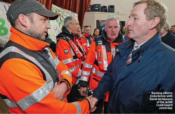  ??  ?? Backing efforts: Enda Kenny with David McNamara of the Achill Coast Guard yesterday