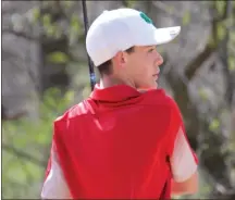  ?? ♦ Scott Herpst ?? Saddle Ridge golfer Hayden Bowman watches his tee shot on the first hole at LaFayette last Monday. Bowman shared low medalist honors with a 48 as the Mustangs took first in a four-team match.