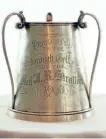  ?? SPECIAL TO THE EXAMINER ?? The 1900 J. R. Stratton Cup recognizes both ladies and gentlemen on the same cup. (Elwood Jones collection)