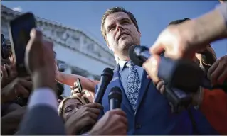  ?? WIN MCNAMEE/GETTY IMAGES/TNS ?? Republican Rep. Matt Gaetz of Florida talks to reporters Tuesday outside the U.S. Capitol after he led a vote to remove fellow Rep. Kevin McCarthy of California from the office of speaker of the House in an unpreceden­ted political maneuver, leaving the House in disarray.