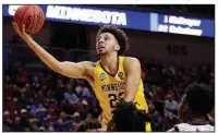  ?? AP/NATI HARNIK ?? Minnesota’s Gabe Kalscheur goes for a layup during the second half in an NCAA Tournament first-round game in Des Moines, Iowa. Kalscheur had 24 points as Minnesota won 86-76.