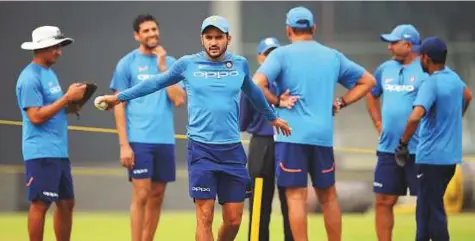  ?? AFP ?? India’s Manish Pandey (centre) stretches during a practice session ahead of their first Twenty20 match against New Zealand at Feroz Shah Kotla in New Delhi yesterday.