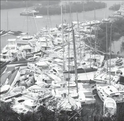  ??  ?? Pleasure craft lie crammed against the shore in Paraquita Bay as the eye of Hurricane Irma passed Tortola, British Virgin Islands September 6, 2017.