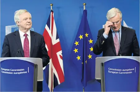  ?? Picture: GETTY ?? UK’s Brexit secretary David Davis with chief Euro negotiator Michel Barnier at the start of talks in Brussels last month