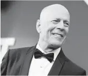  ?? RICH FURY/GETTY 2018 ?? Bruce Willis is retiring from acting after being diagnosed with aphasia, ending a four-decade career.