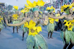  ?? AP ?? Revellers parade during Carnaval des Fleurs, or Carnival of Flowers, celebratio­ns in Port-au-Prince, Haiti in 2013.