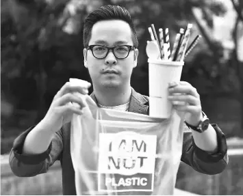  ??  ?? This photograph taken on Jan 24, shows Kumala, founder of Avani Eco, displaying his products during an interview in Jakarta. From bags washing up on Bali’s beaches to food packaging scattered across roads and clogging waterways in cities, Indonesia is...