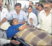  ??  ?? An Amarnath Yatra pilgrim injured in terror attack at the Pahalgam camp in 2000 receives medical attention. AFP FILE